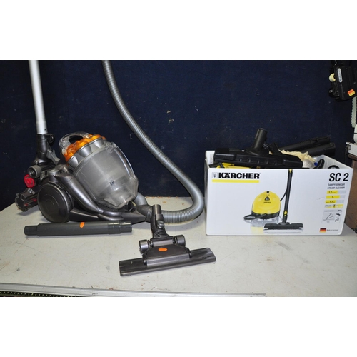 1092 - A KARCHER SC2 STEAM CLEANER in original box with attachments along with a Dyson DC19 vacuum cleaner ... 