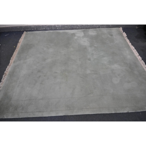 1309 - A G H FRITH LTD LARGE RECTANGULAR GREEN RUG, 305cm x 244cm (condition - in need of a clean)