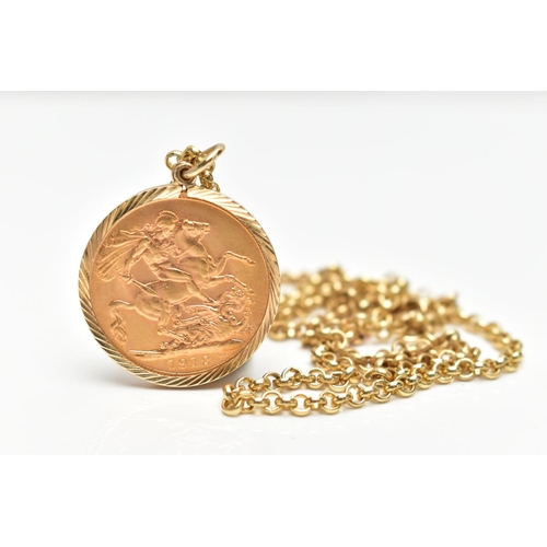 1 - A MOUNTED FULL SOVEREIGN PENDANT AND CHAIN, obverse depicting George V, reverse George and the Drago... 