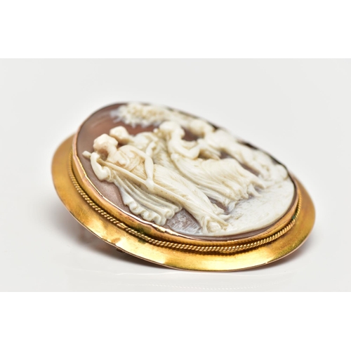 10 - A MID 19TH CENTURY YELLOW METAL CAMEO BROOCH, the shell cameo, carved in high relief, depicting Cupi... 