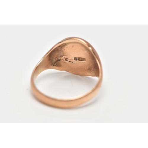 17 - AN EARLY 20TH CENTURY, 9CT GOLD SIGNET RING, polished oval form with engraved initials, tapering sho... 