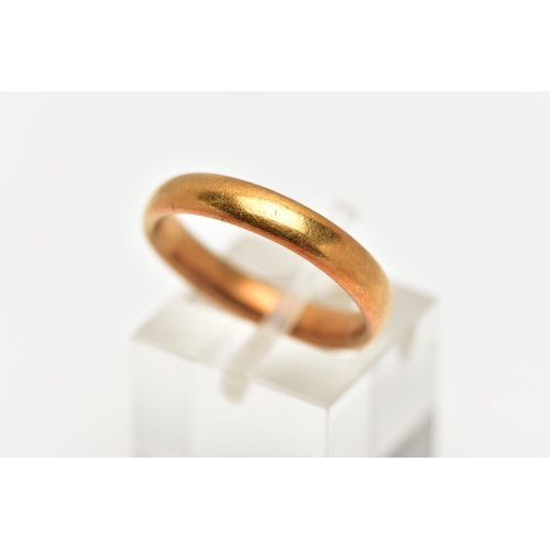 21 - A 22CT GOLD BAND RING, polished yellow gold band, approximate width 3.7mm, hallmark very worn and un... 