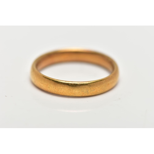 21 - A 22CT GOLD BAND RING, polished yellow gold band, approximate width 3.7mm, hallmark very worn and un... 