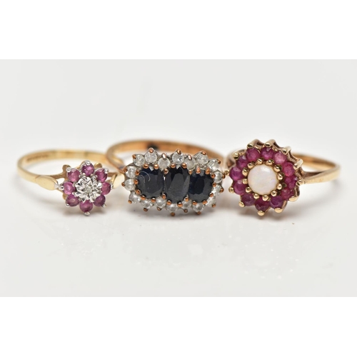 22 - THREE GEM SET RINGS, the first an opal and ruby cluster ring, hallmarked 9ct Birmingham, ring size I... 