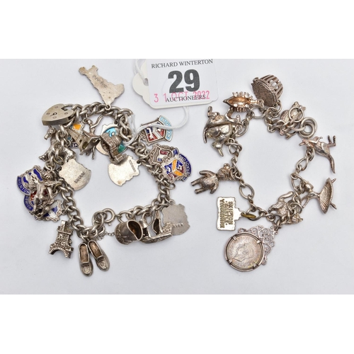 29 - TWO SILVER CHARM BRACELETS, the first fitted with eleven charms in forms such as a kangaroo, cat, te... 