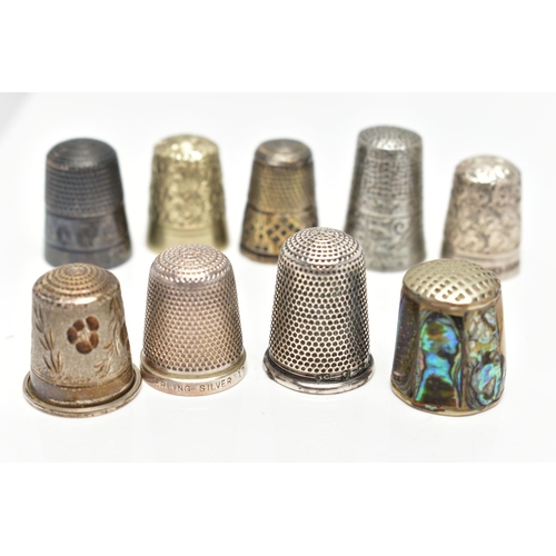 30 - TWELVE THIMBLES, to include six with silver hallmarks, approximate gross weight 27.0 grams, six othe... 