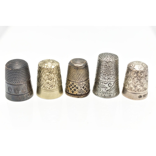 30 - TWELVE THIMBLES, to include six with silver hallmarks, approximate gross weight 27.0 grams, six othe... 