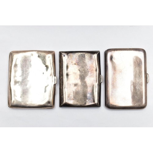 38 - THREE SILVER CIGARETTE CASES, the first of a curved rectangular form, plain polished design with eng... 