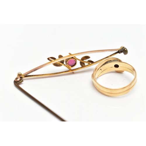 44 - AN EDWARDIAN GARNET AND SEED PEARL BROOCH AND AN OUROBOROS RING, the brooch of an openwork design, f... 