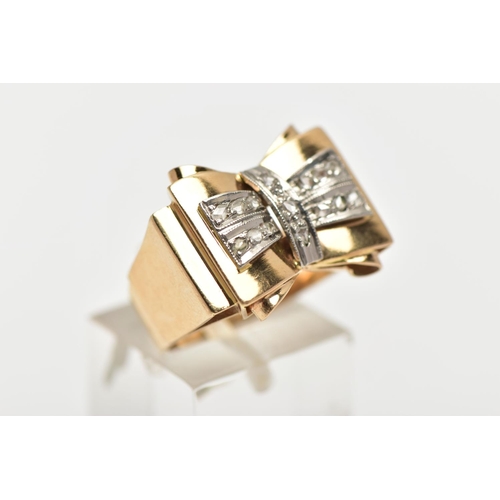 5 - A YELLOW METAL AND DIAMOND DRESS RING, designed as a large bow, fifteen rose cut diamonds set into a... 