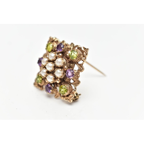 72 - A 9CT GOLD PERIDOT, AMETHYST AND SPLIT PEARL BROOCH, of openwork floral design, the center set with ... 