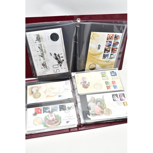 73 - TWO FOLDERS OF MEDALLION COIN COVERS, to include various commemorative packs such as Royal weddings ... 