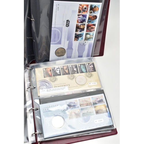 73 - TWO FOLDERS OF MEDALLION COIN COVERS, to include various commemorative packs such as Royal weddings ... 