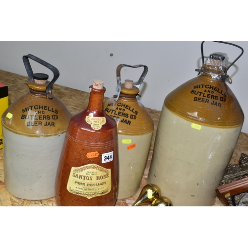 344 - THREE MITCHELLS AND BUTLER LTD STONEWARE BEER JARS WITH METAL HANDLES, heights approx. 49cm and 37cm... 