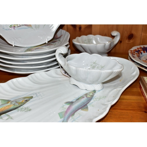 371 - A MODERN PORCELAINE DE SOLOGNE FISH SET, comprising serving platter, two sauce boats and six shell s... 