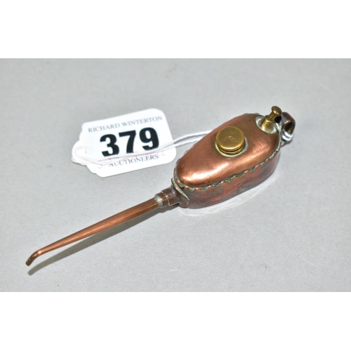 379 - A MECCANO COPPER AND BRASS OIL CAN, engraved 'K' to the front, working pump, stamped to the base, ov... 