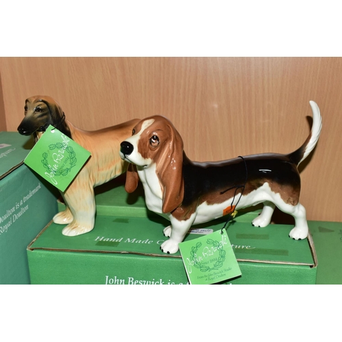 415 - NINE BOXED BESWICK DOG FIGURES, comprising a white gloss Bull Terrier 'Romany Rhinestone' - Large mo... 