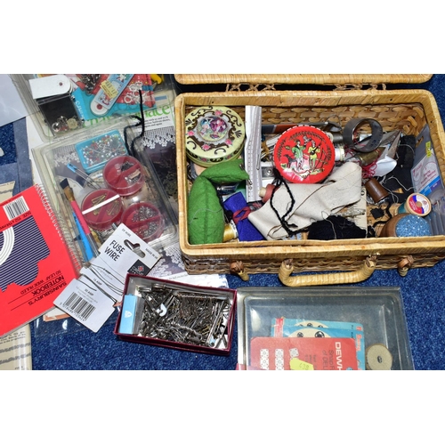 438 - FOUR BOXES OF ASSORTED HABERDASHERY ITEMS,  to include a box of approx. fifty sewing patterns for la... 