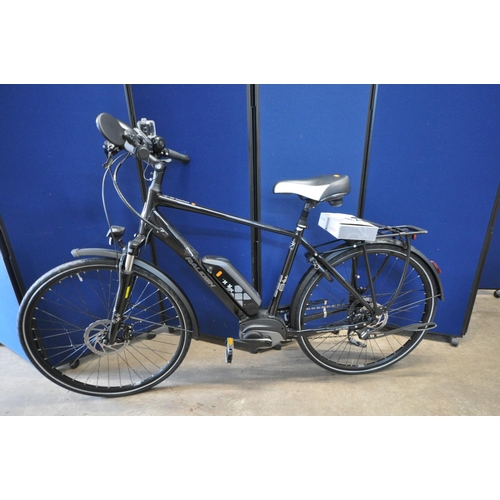 1000 - A RALEIGH MOTUS GRAND TOUR ELECTRIC BICYCLE with one battery, charger, battery and wheel lock keys, ... 