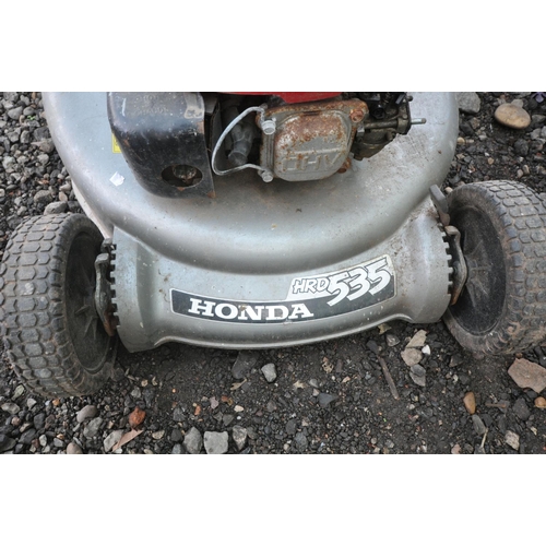 1001 - A HONDA HRD535 SELF PROPELLED PETROL LAWN MOWER Spares or Repairs some parts missing from engine