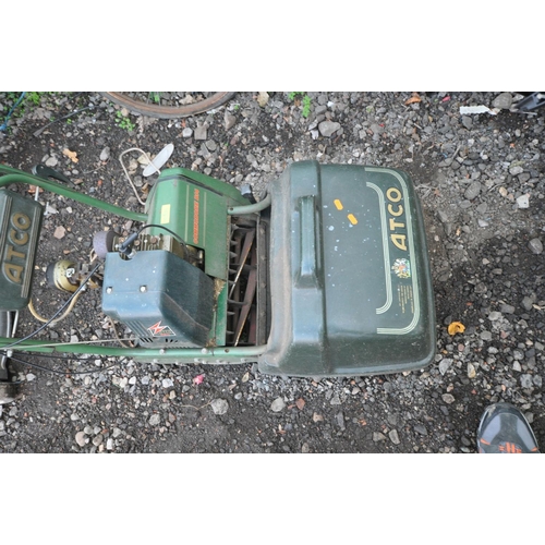 1003 - AN ATCO COMMODORE B14 PETROL CYLINDER MOWER with grass box (engine pulls freely but hasn't started)