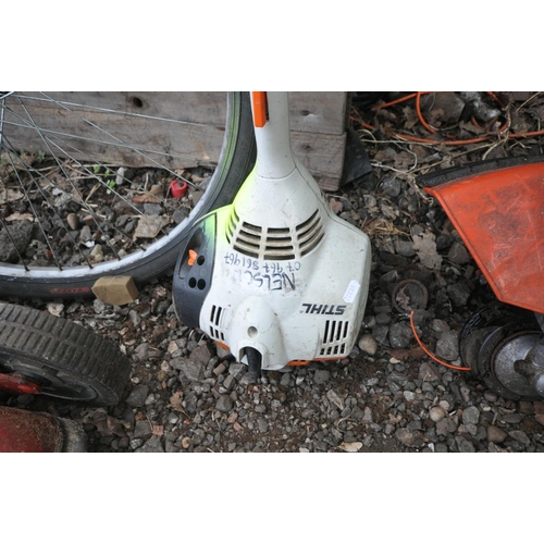 1008 - A STIHL FS56RC PETROL STRIMMER (starts and runs) and a Stihl FS44 petrol strimmer (engine pulls free... 