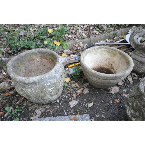 1017 - A PAIR OF COMPOSITE GARDEN URNS with scrolled detail to side height 45cm along with two other plante... 