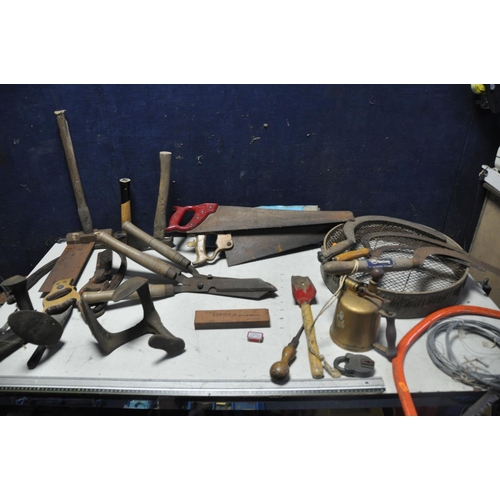 1073 - A SELECTION OF VINTAGE TOOLS to include four vintage scythes, vintage saws, two pairs of loppers, sa... 