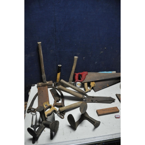 1073 - A SELECTION OF VINTAGE TOOLS to include four vintage scythes, vintage saws, two pairs of loppers, sa... 