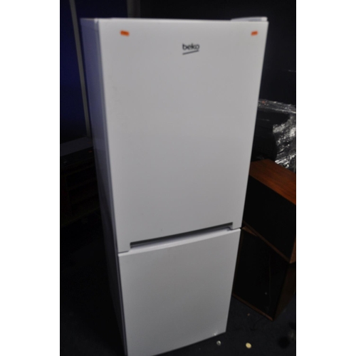 1075 - A BEKO CRFG1552W FRIDGE FREEZER measuring width 55cm x depth 57cm x height 152cm (PAT pass and worki... 