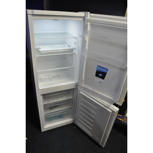 1075 - A BEKO CRFG1552W FRIDGE FREEZER measuring width 55cm x depth 57cm x height 152cm (PAT pass and worki... 