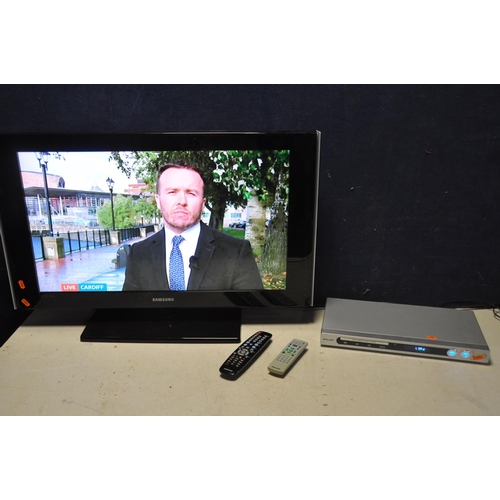 1076 - A SAMSUNG LE32A556P1F 32in TV with remote, along with a Pacific DVD1002MK2 (both PAT pass and workin... 