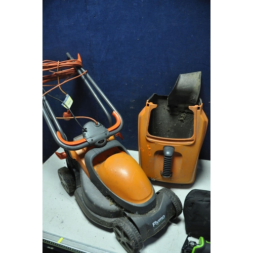 1086 - A FLYMO 32VC CHEVRON LAWN MOWER with grass box along with a Wolf combo tool plus and a Hawkforce CRS... 