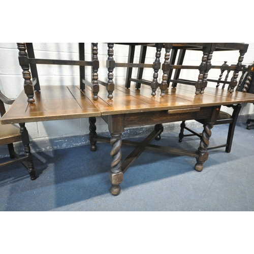 1219 - AN EARLY 20TH CENTURY OAK BARLEY TWIST DRAW LEAF DINING TABLE, extended length 213cm x closed width ... 