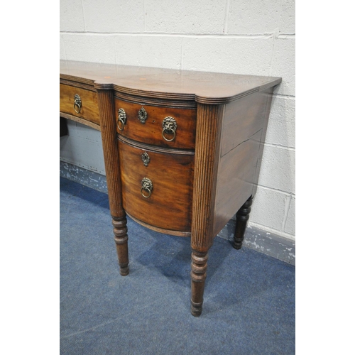 1231 - A GEORGE IV WALNUT PEDESTAL SIDEBOARD, with two drawers, above cupboard doors, flanking a single con... 