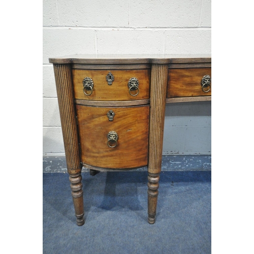 1231 - A GEORGE IV WALNUT PEDESTAL SIDEBOARD, with two drawers, above cupboard doors, flanking a single con... 