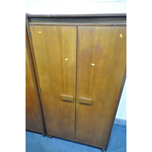 1233 - A MID-CENTURY WHITE AND NEWTON BEDROOM SUITE, comprising a three door wardrobe, largest width 139cm ... 