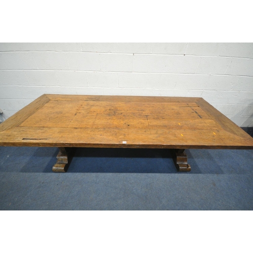 1236 - A RECLAIMED WOOD RUSTIC FARMHOUSE TABLE, on trestle legs united by a single stretcher, length 251cm ... 