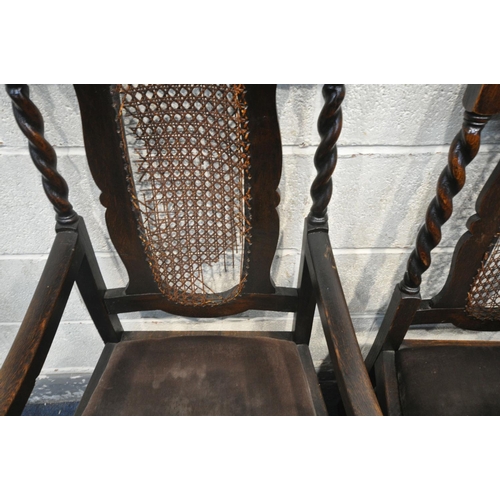 1238 - A SET OF EIGHT 20TH CENTURY OAK DINING CHAIRS, with carved top, flanked by finials and barley twist ... 