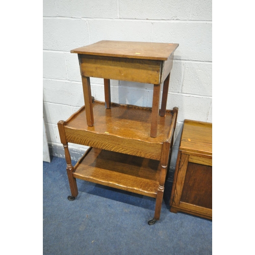 1245 - AN EARLY 20TH CENTURY OAK TWO DOOR CABINET, width 75cm x depth 35cm x height 64cm, an oak tea trolle... 