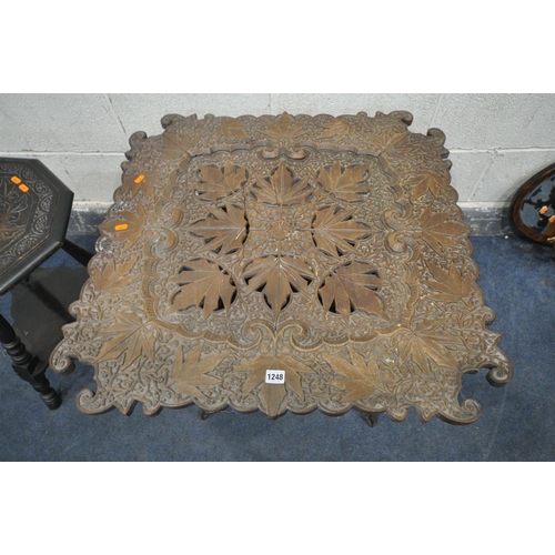 1248 - A CARVED WOOD ANGLO INDIAN FOLDING TABLE, 79cm x height 60cm (condition:-missing piece to base, repa... 