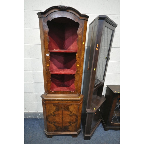 1271 - A WALNUT OPEN CORNER CUPBOARD, an oak finish corner cupboard and an oak lead glazed two door bookcas... 