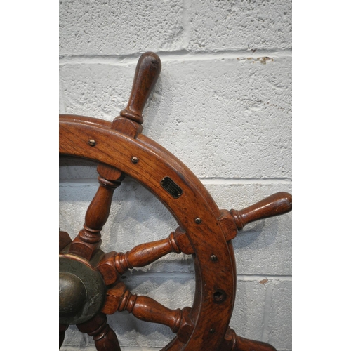 1280 - A VINTAGE STAINED SHIPS WHEEL, with a Danish  plaque owned by V Nielsen, diameter 86cm