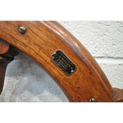 1280 - A VINTAGE STAINED SHIPS WHEEL, with a Danish  plaque owned by V Nielsen, diameter 86cm