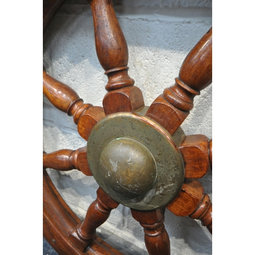 1280 - A VINTAGE STAINED SHIPS WHEEL, with a Danish  plaque owned by V Nielsen, diameter 86cm