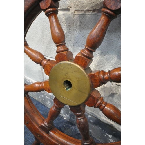 1280 - A VINTAGE STAINED SHIPS WHEEL, with a Danish  plaque owned by V Nielsen, diameter 86cm