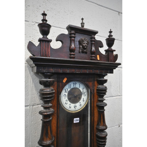 1283 - A 19TH CENTURY WALNUT VIENNA CLOCK, with Arabic numerals, height 116cm (winding key and pendulum)