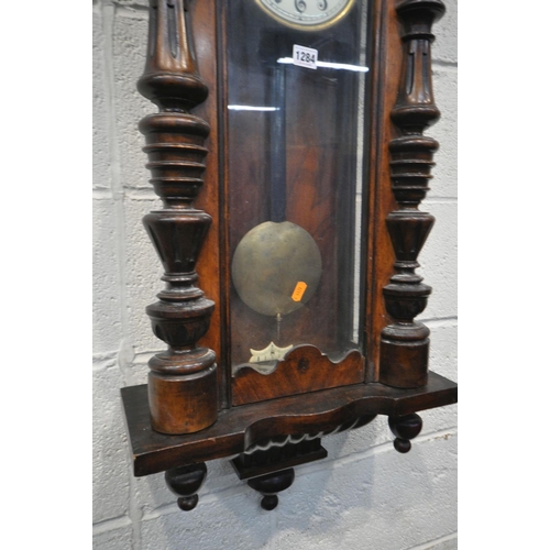 1283 - A 19TH CENTURY WALNUT VIENNA CLOCK, with Arabic numerals, height 116cm (winding key and pendulum)