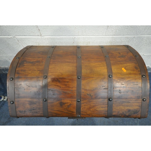 1284 - A HARDWOOD DOME TOP TRUNK, with metal banding, and iron handles, on bun feet, width 78cm x depth 55c... 