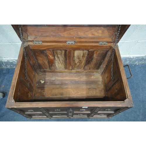 1284 - A HARDWOOD DOME TOP TRUNK, with metal banding, and iron handles, on bun feet, width 78cm x depth 55c... 